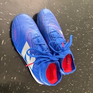 New Balance Kids Blue and Red Sneakers